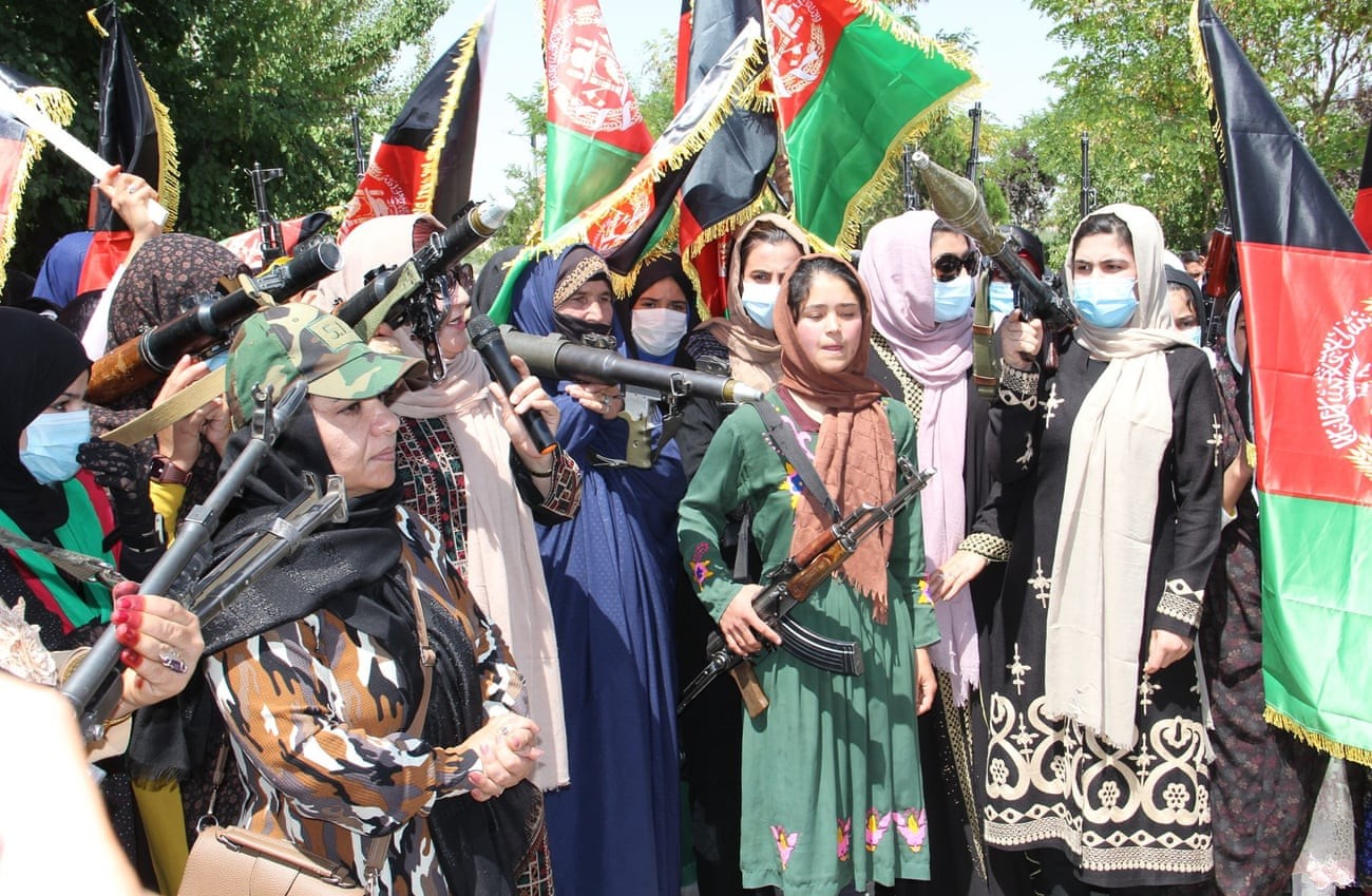 Afghan women take to the streets carrying weapons against the Taliban